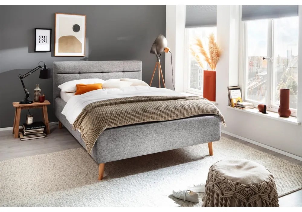 Szürke kárpitozott ágyneműtartós franciaágy ágyráccsal 140x200 cm Lotte – Meise Möbel