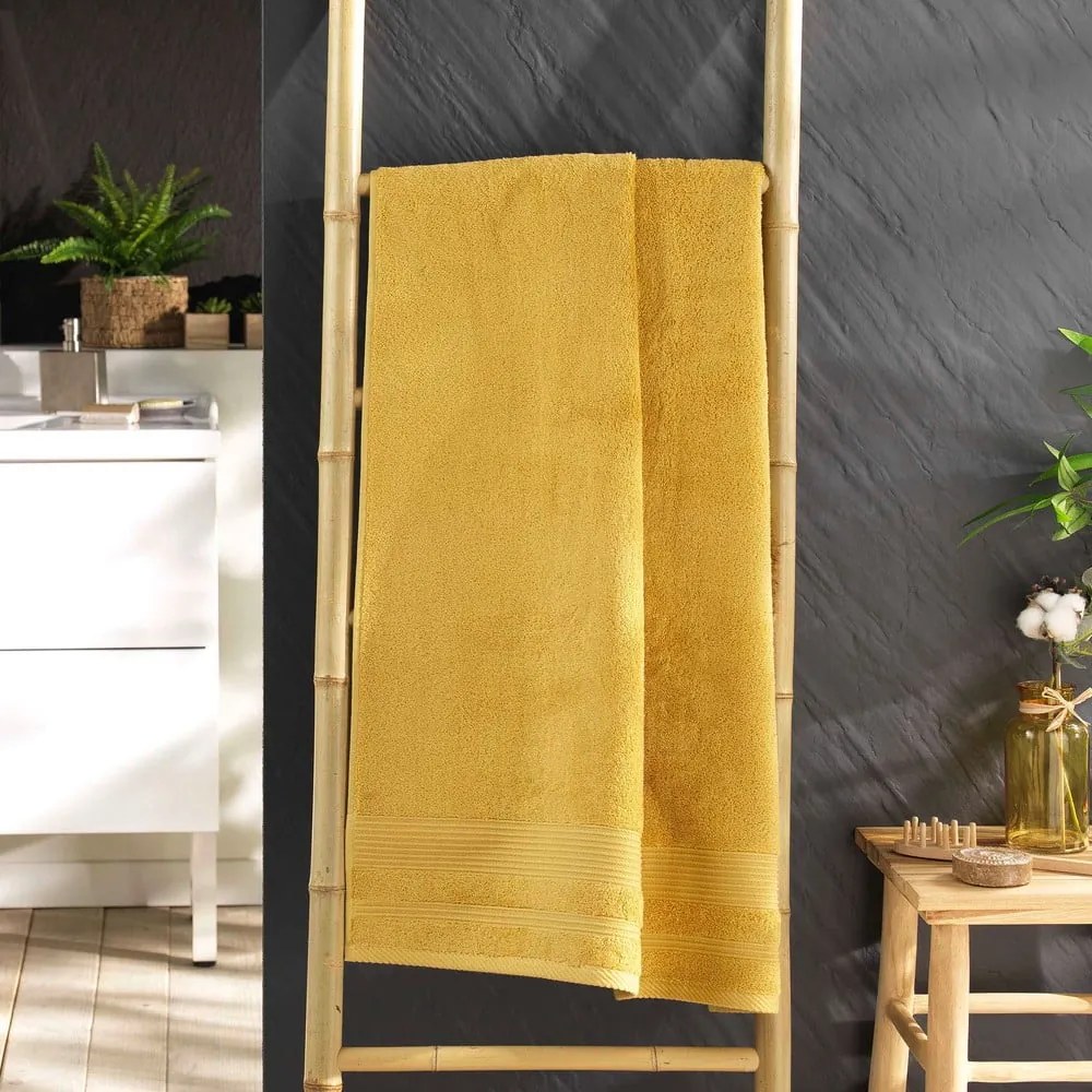 Sárga frottír pamut fürdőlepedő 70x130 cm Tendresse – douceur d'intérieur