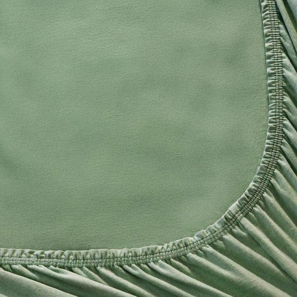 Goldea jersey körgumis lepedő - khaki színű 120 x 200 cm