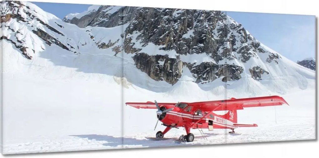 Vászonkép 150x70 Piros repülőgép a hegyekben
