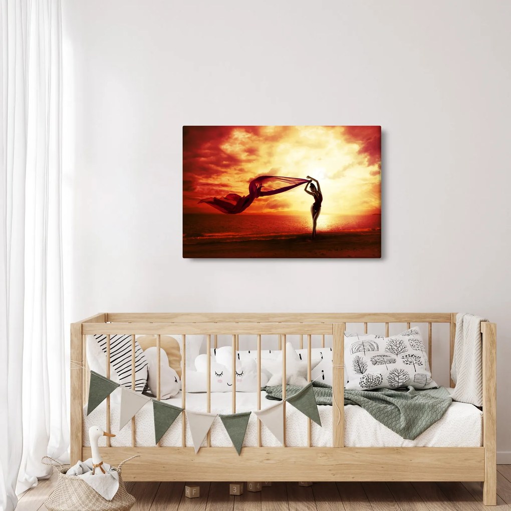 Kép - egy nő sziluettje a naplementében (90x60 cm)