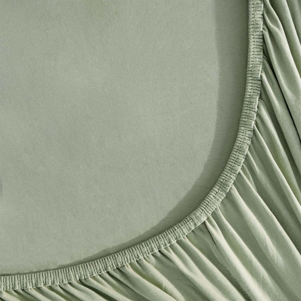 Goldea jersey gumis lepedő - zsálya színű 90 x 200 cm