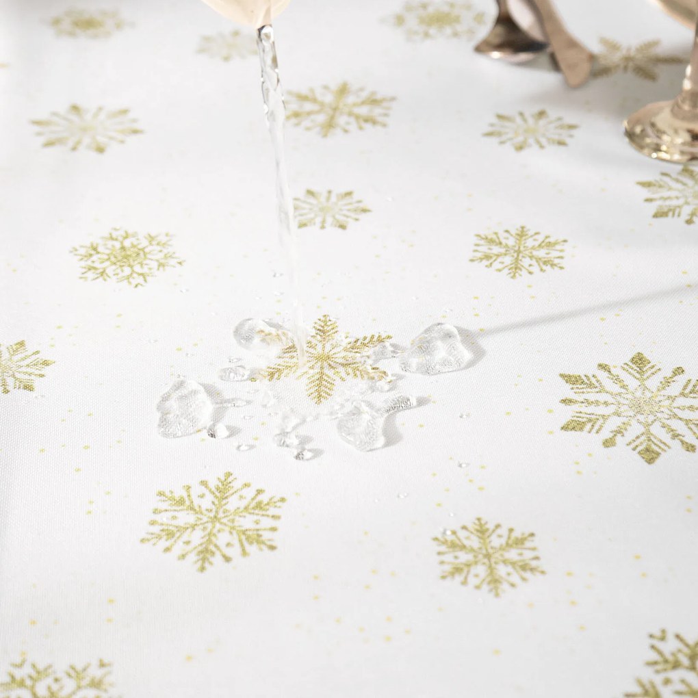 Goldea karácsonyi teflonbevonatú asztalterítő - arany hópelyhek 100 x 100 cm