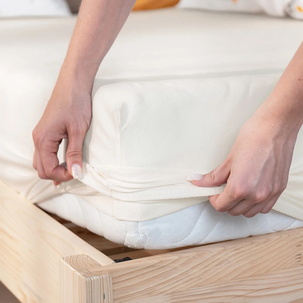 Goldea jersey körgumis lepedő - krémszínű 160 x 200 cm