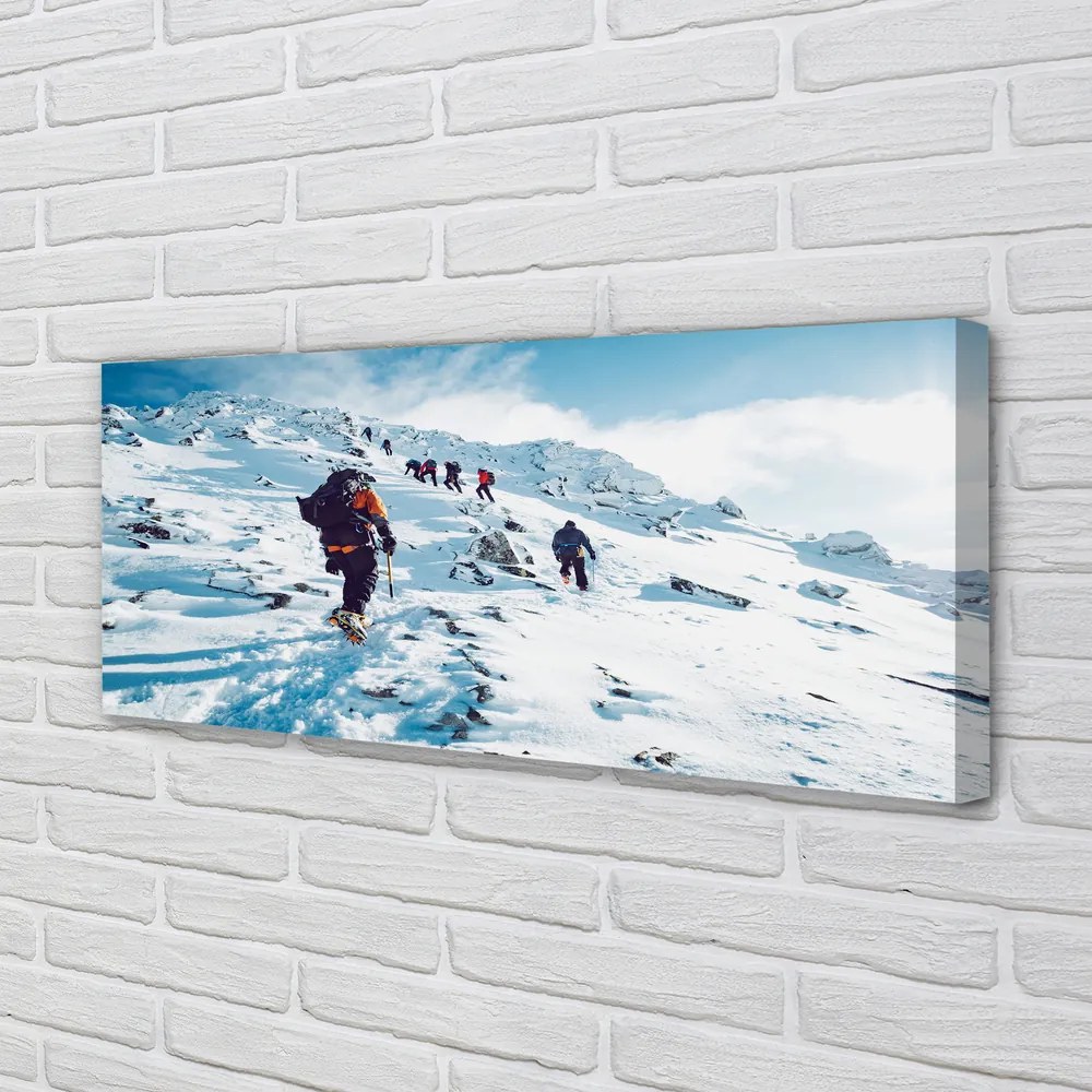 Canvas képek Hegymászás a hegyekben télen 100x50 cm
