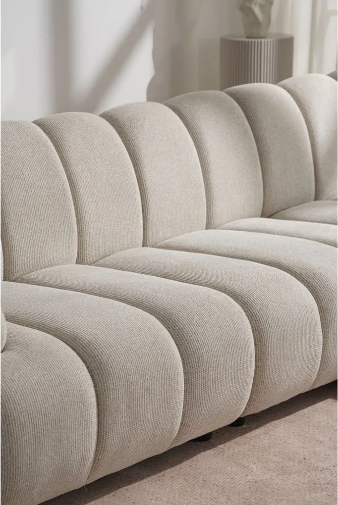 Taza 3,5 személyes kanapé, puffal, jobbos