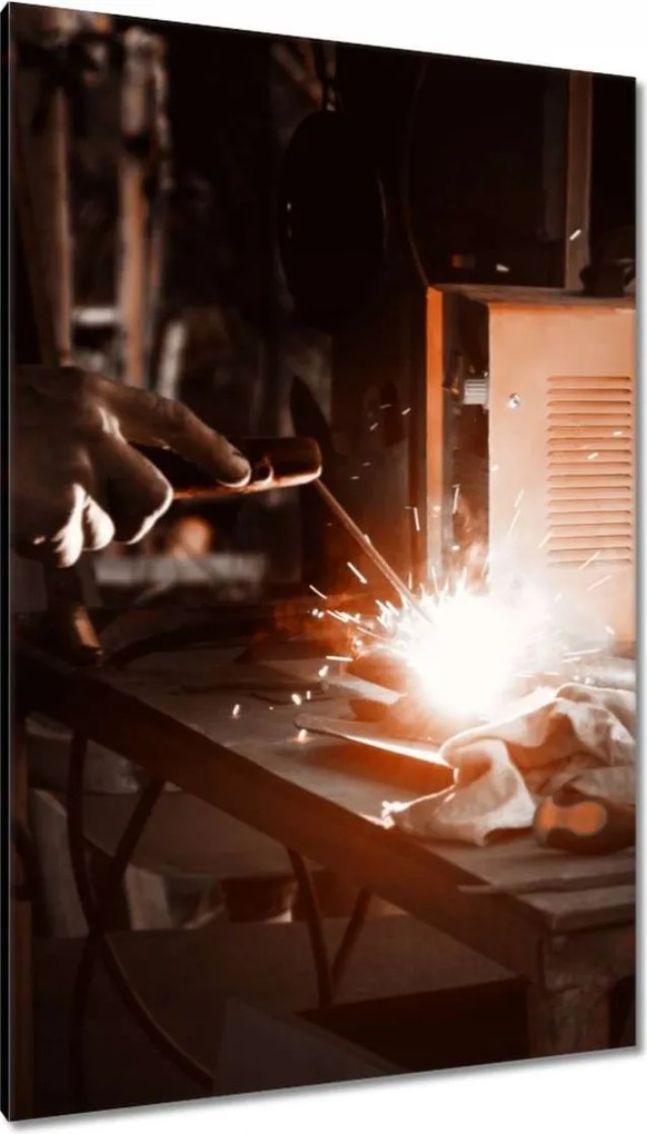 Vászonkép 80x120 Hegesztő hegesztő lapát
