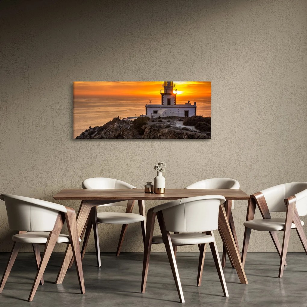 Világítótorony naplementekor képe (120x50 cm)