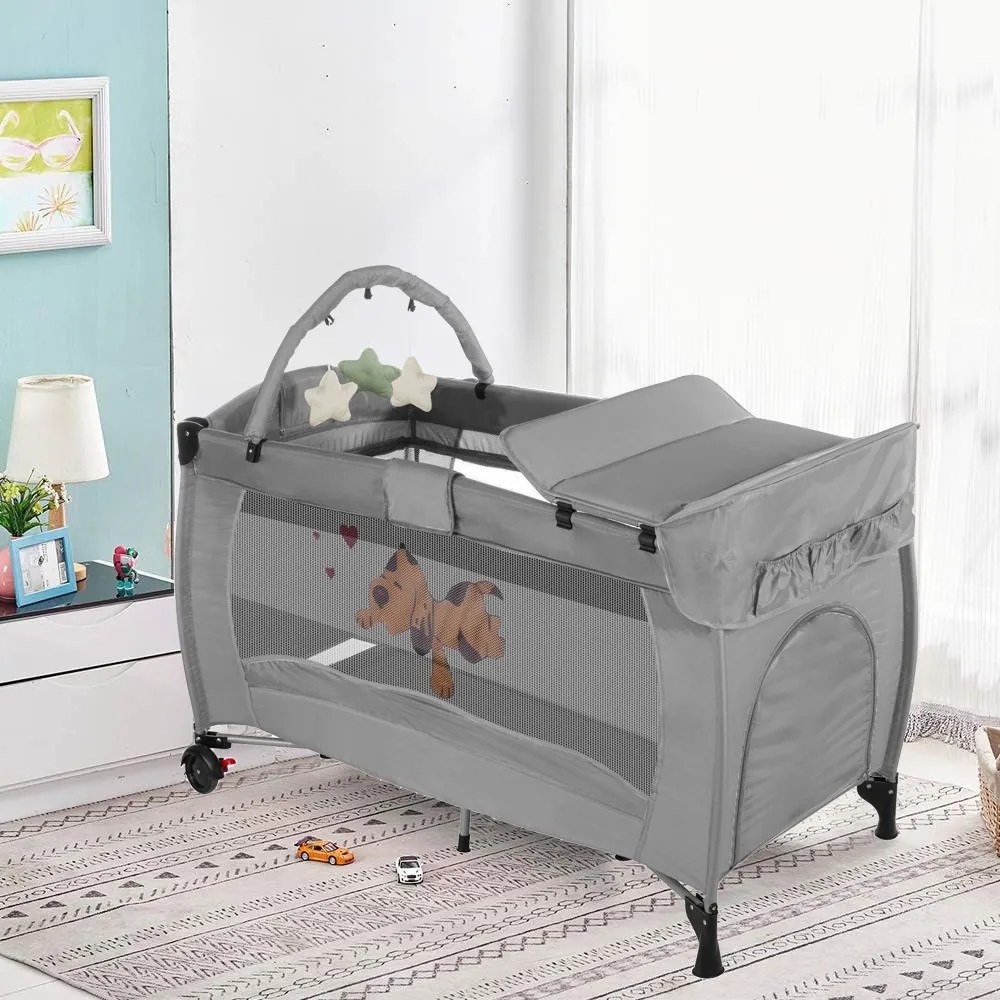 Utazóágy pelenkázó lappal és játékhíddal, szürke