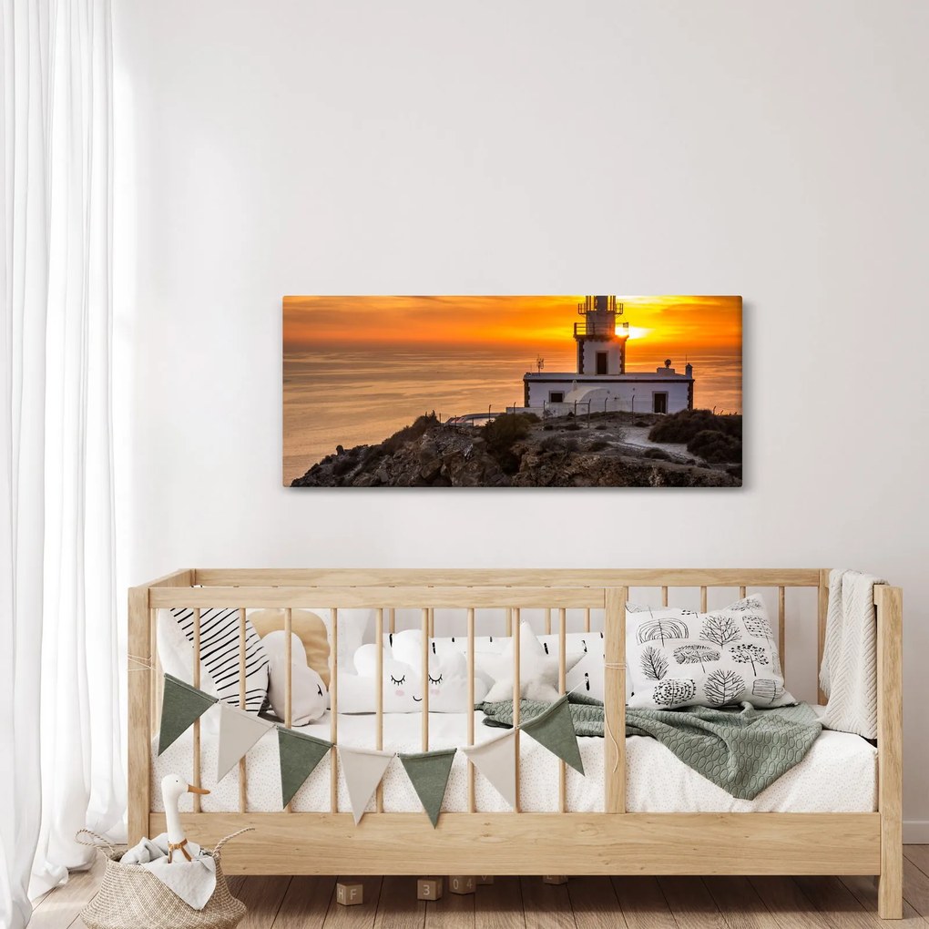 Világítótorony naplementekor képe (120x50 cm)