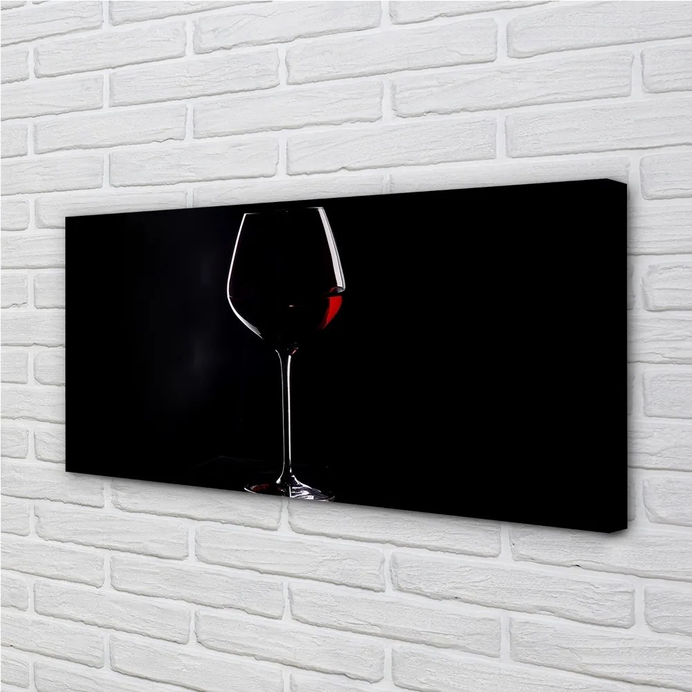 Canvas képek Fekete háttér egy pohár bor 100x50 cm