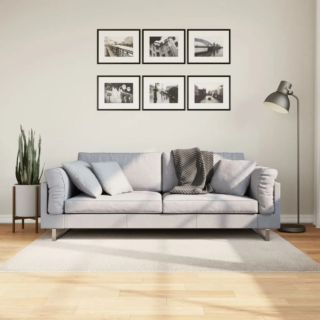 IZA krémszínű rövid szálú skandináv stílusú szőnyeg 120x170 cm