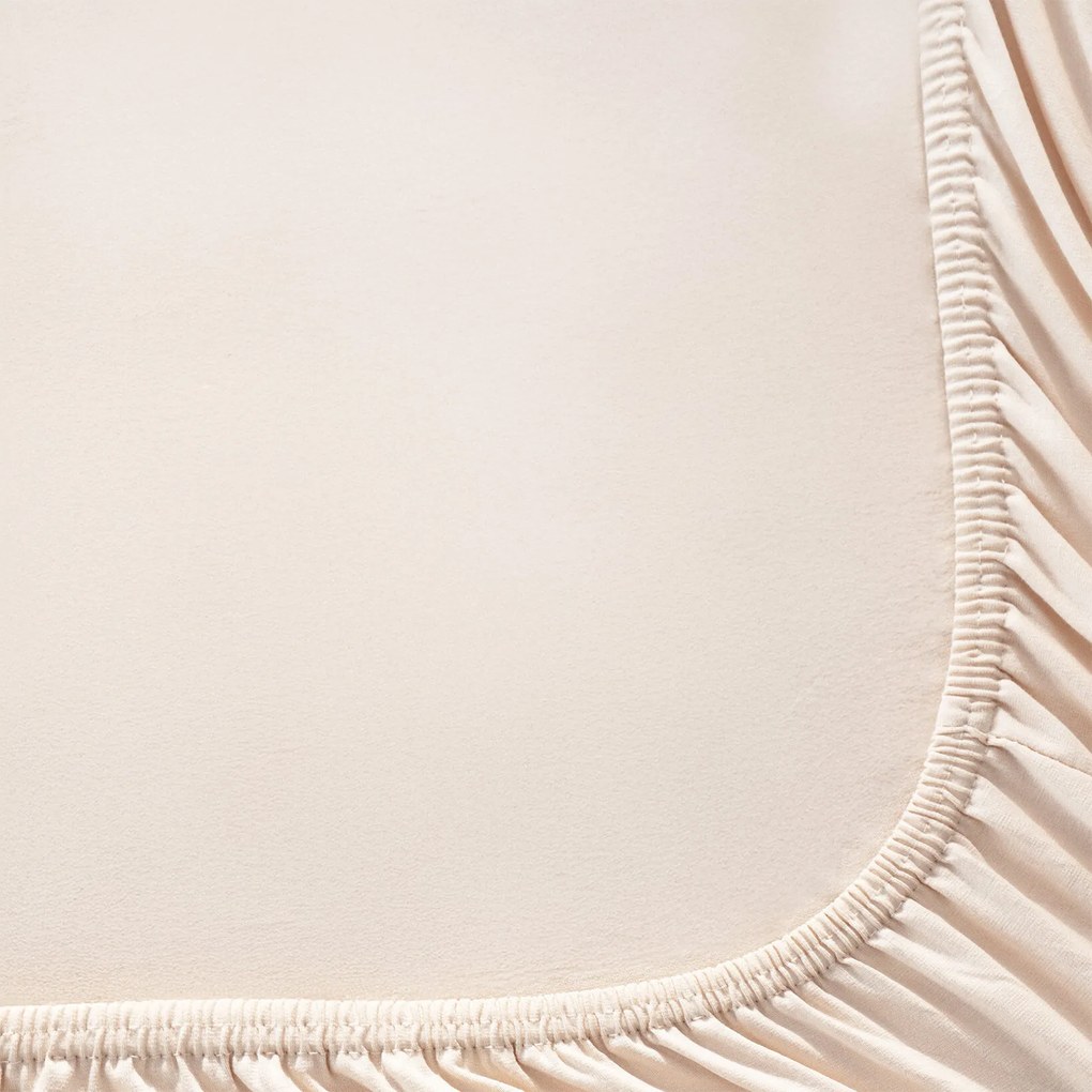 Goldea jersey gumis lepedő - bézs 160 x 200 cm