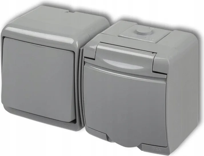 Szürke egykapcsolós kapcsoló falra szerelhető aljzattal IP54 Junior Karlik