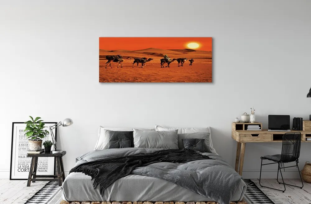 Canvas képek Tevék az emberek sivatagi nap ég 125x50 cm