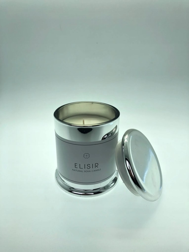 Luxus természetes illatú gyertya Maxxo Elisir Silver citrusfélék, virágok akár 40 órán át