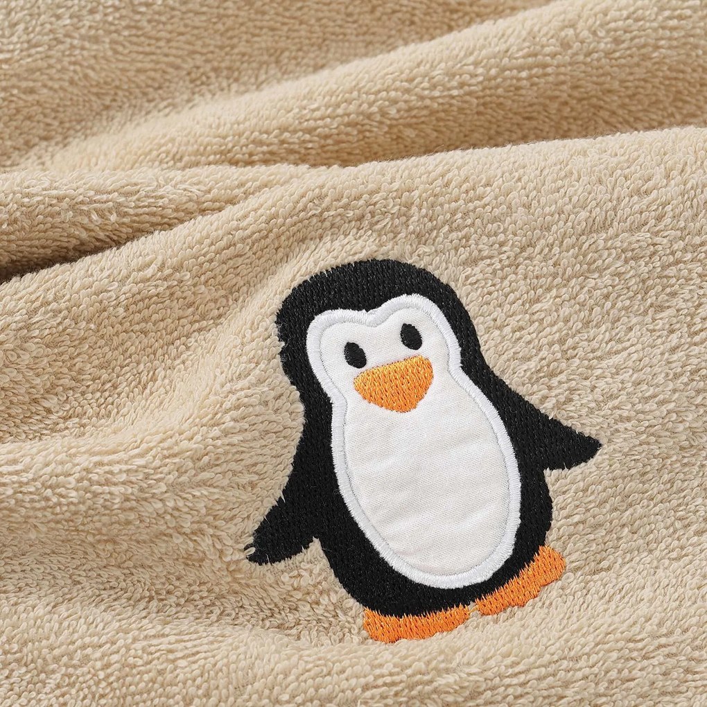 Goldea gyermek frottír törölköző - pingvin bézsen 30 x 50 cm