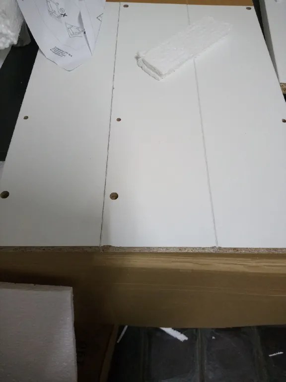 AKCIÓ Fekete étkezőasztal fehér lábakkal MADO 120x80 II. osztály