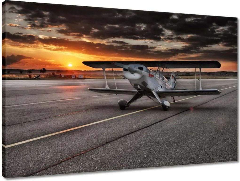 Vászonkép 60x40 Repülőgép naplemente