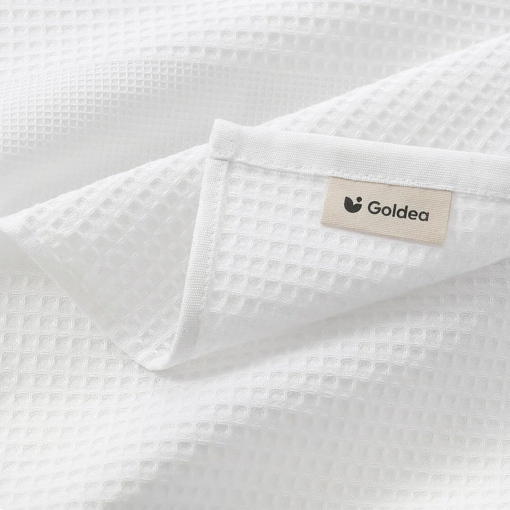 Goldea karácsonyi hímzett waffle konyharuha - gömbök az ágon fehér háttéren 50 x 70 cm