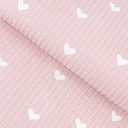Goldea pamut krepp anyag - szívecskék, púderrózsaszín alapon 160 cm