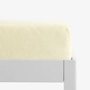 Goldea körgumis frottír lepedő - világossárga 90 x 200 cm