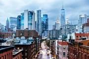 Fotográfia Illuminated Manhattan Financial District skyscrapers seen, Alexander Spatari