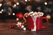 Fotográfia wooden desk space red mug and xmas tree, Kseniya Ovchinnikova