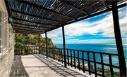 Háttérkép Erkély a tengerparton sziklás tájkép tengerre néző 208x146 +ragasztó