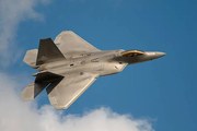 Fotográfia F22 Raptor Jet Fighter flying in the sky, JohnnyPowell