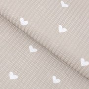 Goldea pamut krepp anyag - szívecskék, latté színű alapon 160 cm