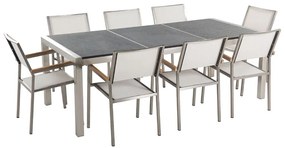 Nyolcszemélyes fekete gránit étkezőasztal fehér textilén székekkel GROSSETO Beliani