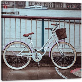 Vintage kerékpár a városban a hídnál vászonkép 90x90
