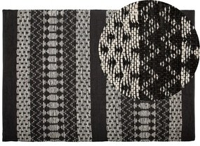 Fekete és bézs bőrszőnyeg 140 x 200 cm SOKUN Beliani
