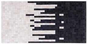 Fekete és fehér bőrszőnyeg 80 x 150 cm BOLU Beliani