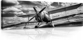 Vászonkép 145x45 Kétfedelű repülőgép retro felhők légi közlekedés