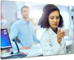 Vászonkép 70x50 Gyógyszerésznő tabletta