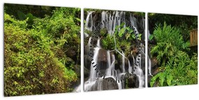 Egy kép a vízesésekről egy trópusi erdőben (órával) (90x30 cm)