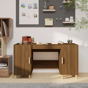 Barna tölgyszínű szerelt fa íróasztal 140 x 50 x 75 cm