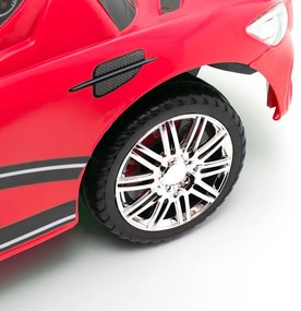 Zenélő bébitaxi Baby Mix RACER piros