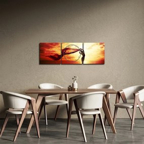 Kép - egy nő sziluettje a naplementében (órával) (90x30 cm)