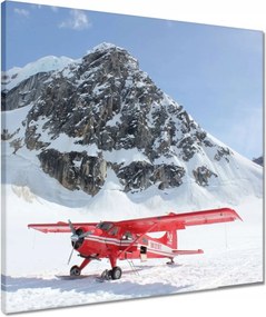 Vászonkép 50x50 Piros repülőgép a hegyekben