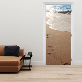 Fotótapéta ajtóra - Lábnyomok a homokban és a tengerben (95x205cm)