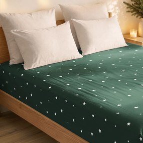 Goldea karácsonyi pamut gumis lepedő - csillagok sötétzöldön 80 x 160 cm