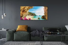 Canvas képek Görögország parti sziklák virágok 125x50 cm