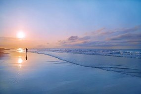 Fotográfia Person walking on beach at sunrise, Shannon Fagan, (40 x 26.7 cm)