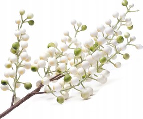 Ág krémszínű gyümölcsökkel golyókkal a díszítéshez