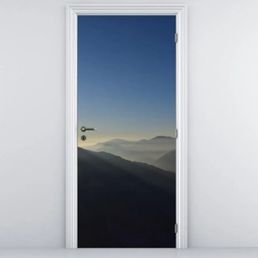 Fotótapéta ajtóra - A hegycsúcsok felett (95x205cm)