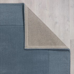 Sötétkék kézi szövésű gyapjú szőnyeg 120x170 cm Textured Wool Border – Flair Rugs