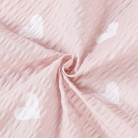 Goldea pamut krepp anyag - szívecskék, púderrózsaszín alapon 160 cm